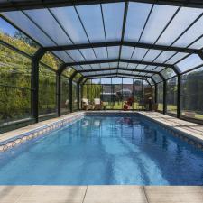 Pool enclosure washing